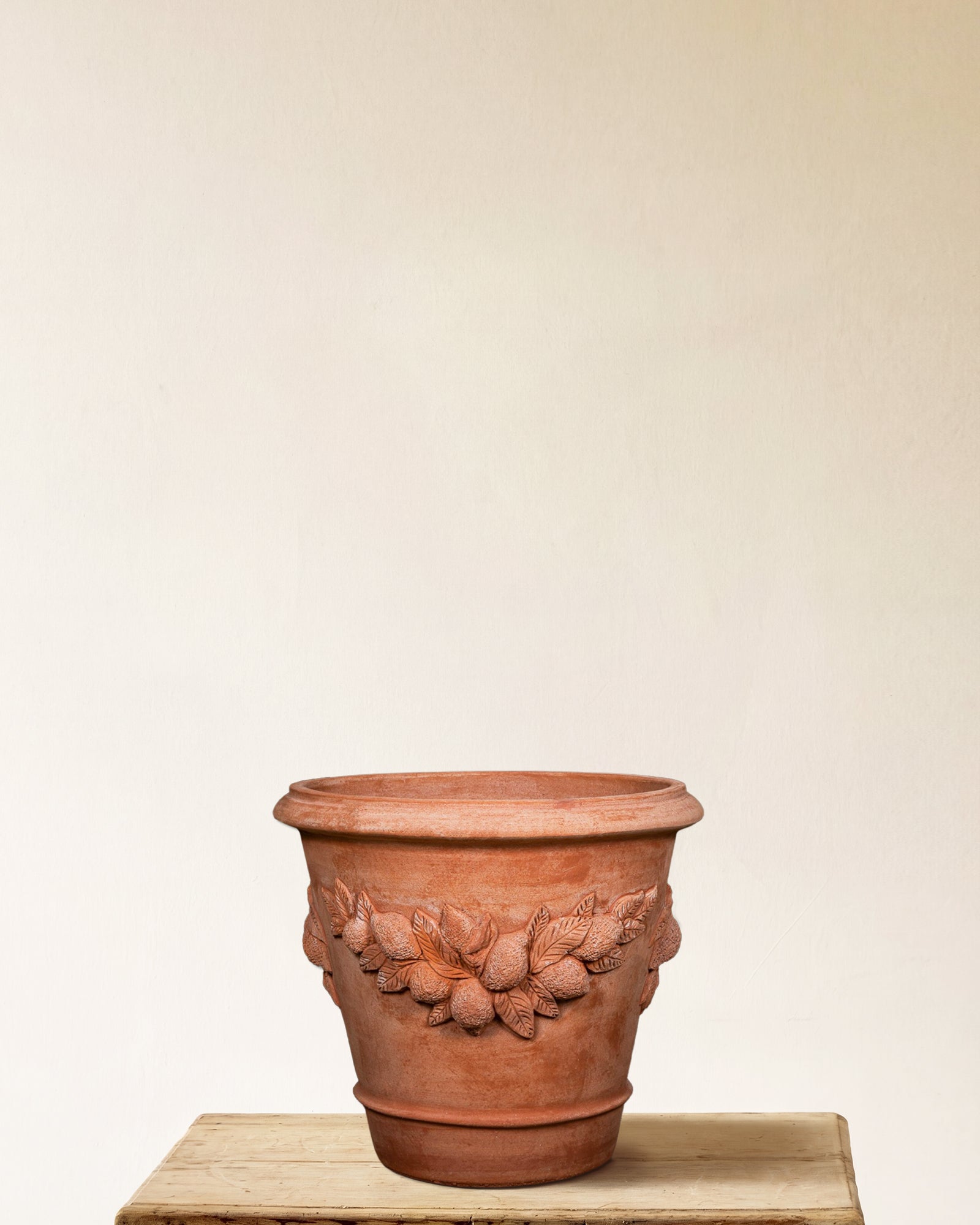 Italian terracotta planter with sculpted lemon and leaf relief band, made in Impruneta, Small