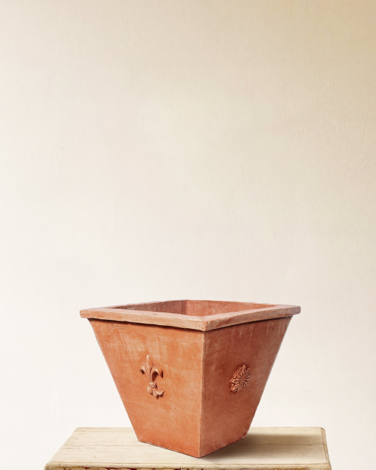 Italian terracotta planter, square flared form with embossed crest on each face, made in Impruneta, 24" x 21"