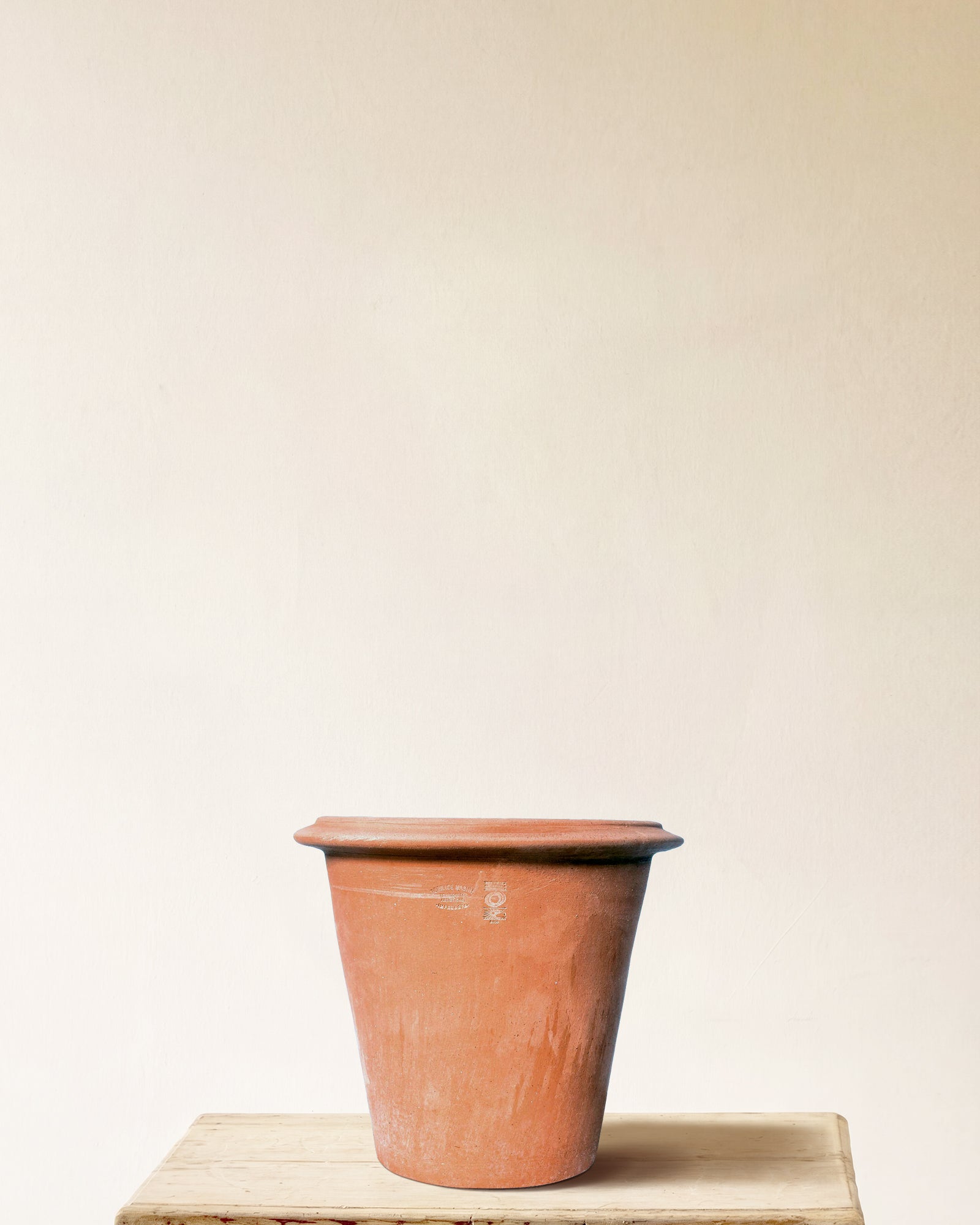 Italian terracotta planter with tapered form and wide rolled rim, made in Impruneta, 18" x 17"