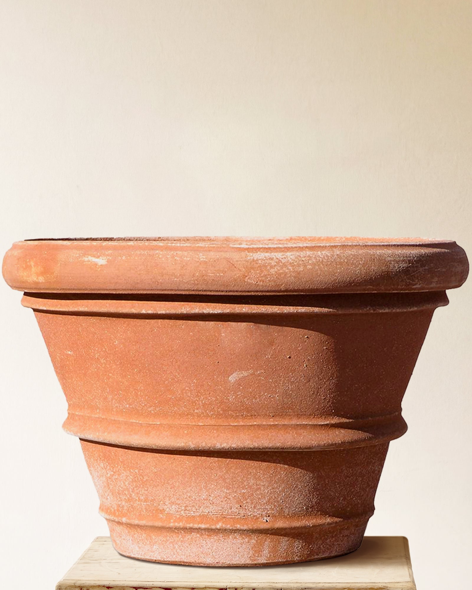 Italian terracotta planter with classic double-rim form and gently flared body, made in Impruneta, 51" x 39"
