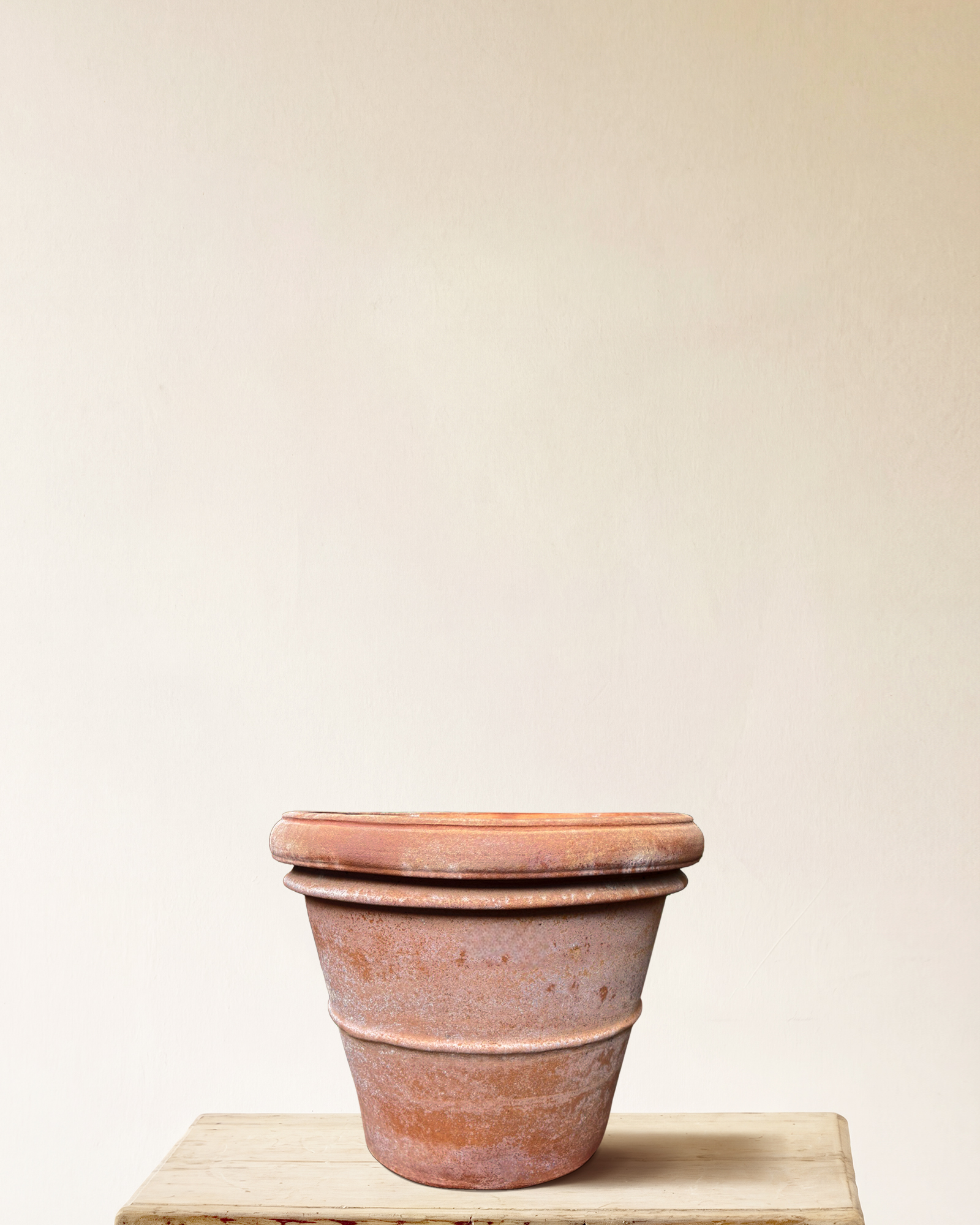 Italian terracotta planter with rounded form and wide rolled rim, smooth surface, made in Impruneta, 20" x 17"