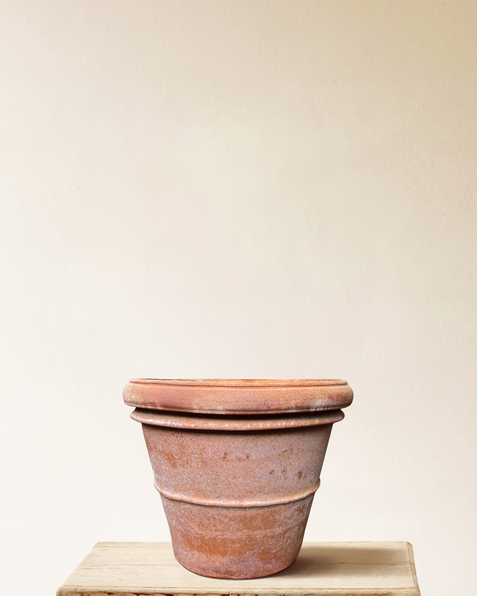 Italian terracotta planter with rounded form and wide rolled rim, smooth surface, made in Impruneta, 22" x 18"