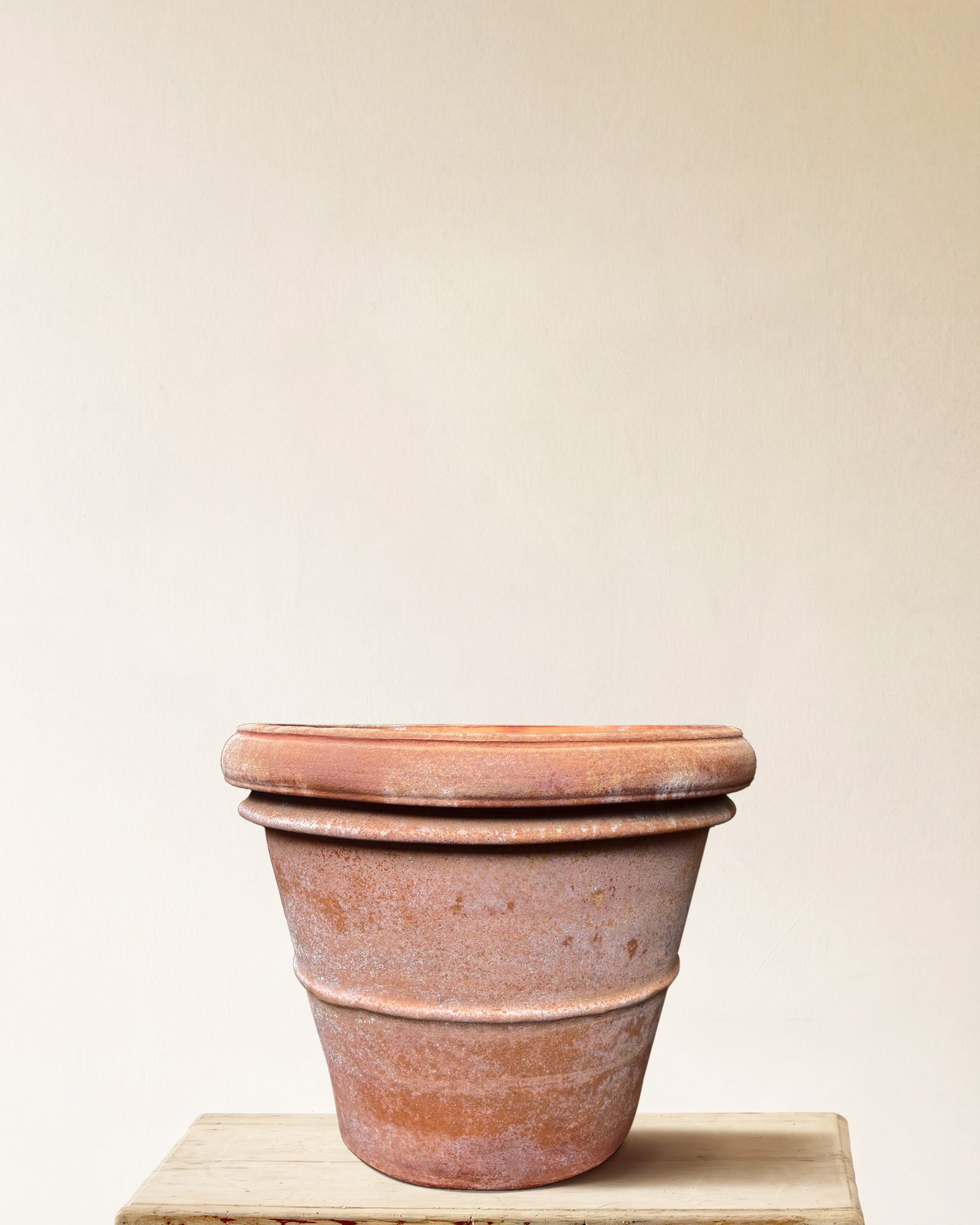 Italian terracotta planter with rounded form and wide rolled rim, smooth surface, made in Impruneta, 24" x 21"