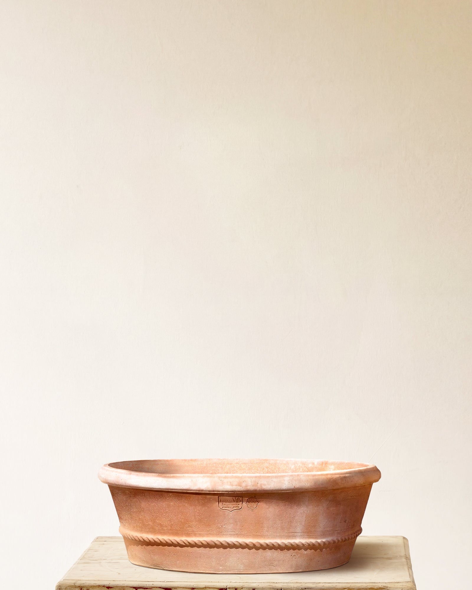 Italian terracotta oval planter with wide low profile and rope band at base, made in Impruneta, 26" x 10"