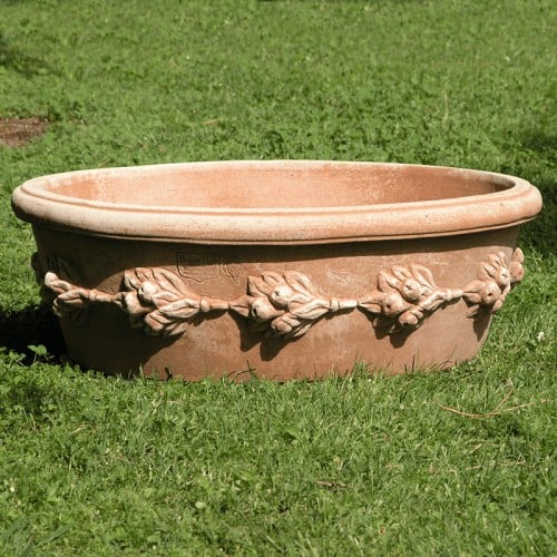 Zangola con Ghirlande Italian terracotta oval planter with sculpted garland band on lawn