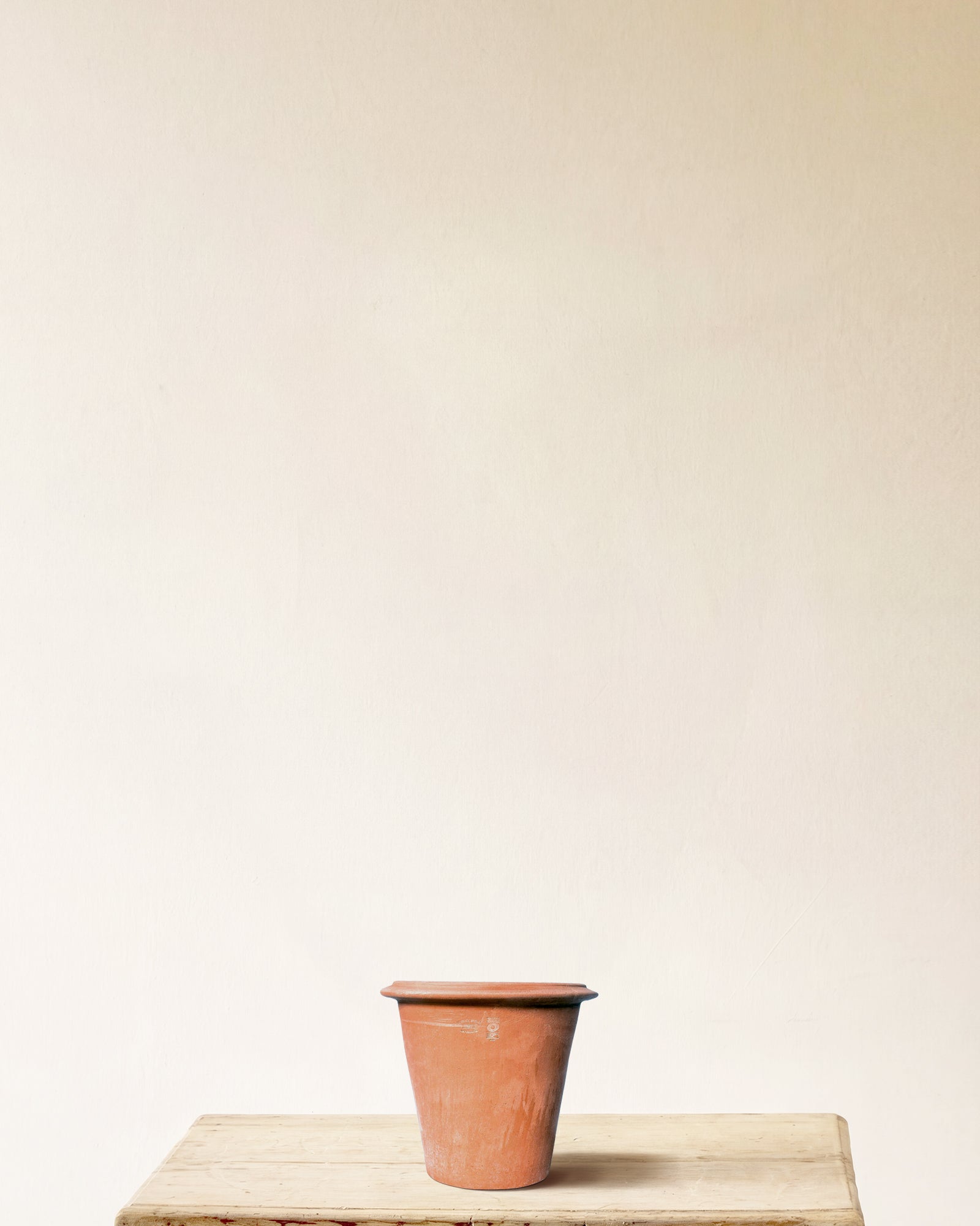 Italian terracotta planter with tapered form and wide rolled rim, made in Impruneta, 10" x 11"