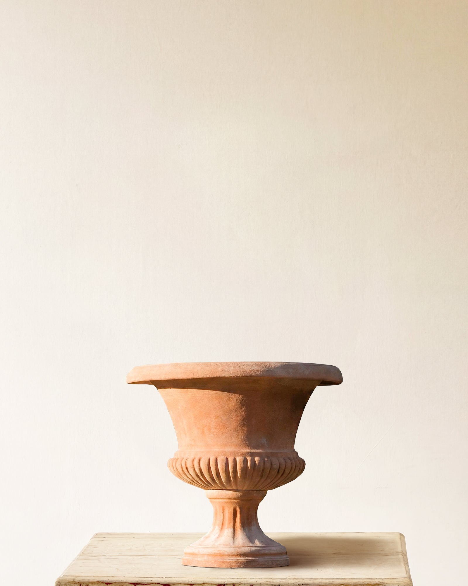 Italian terracotta urn with fluted bowl and pedestal base, made in Impruneta, 22" x 24"