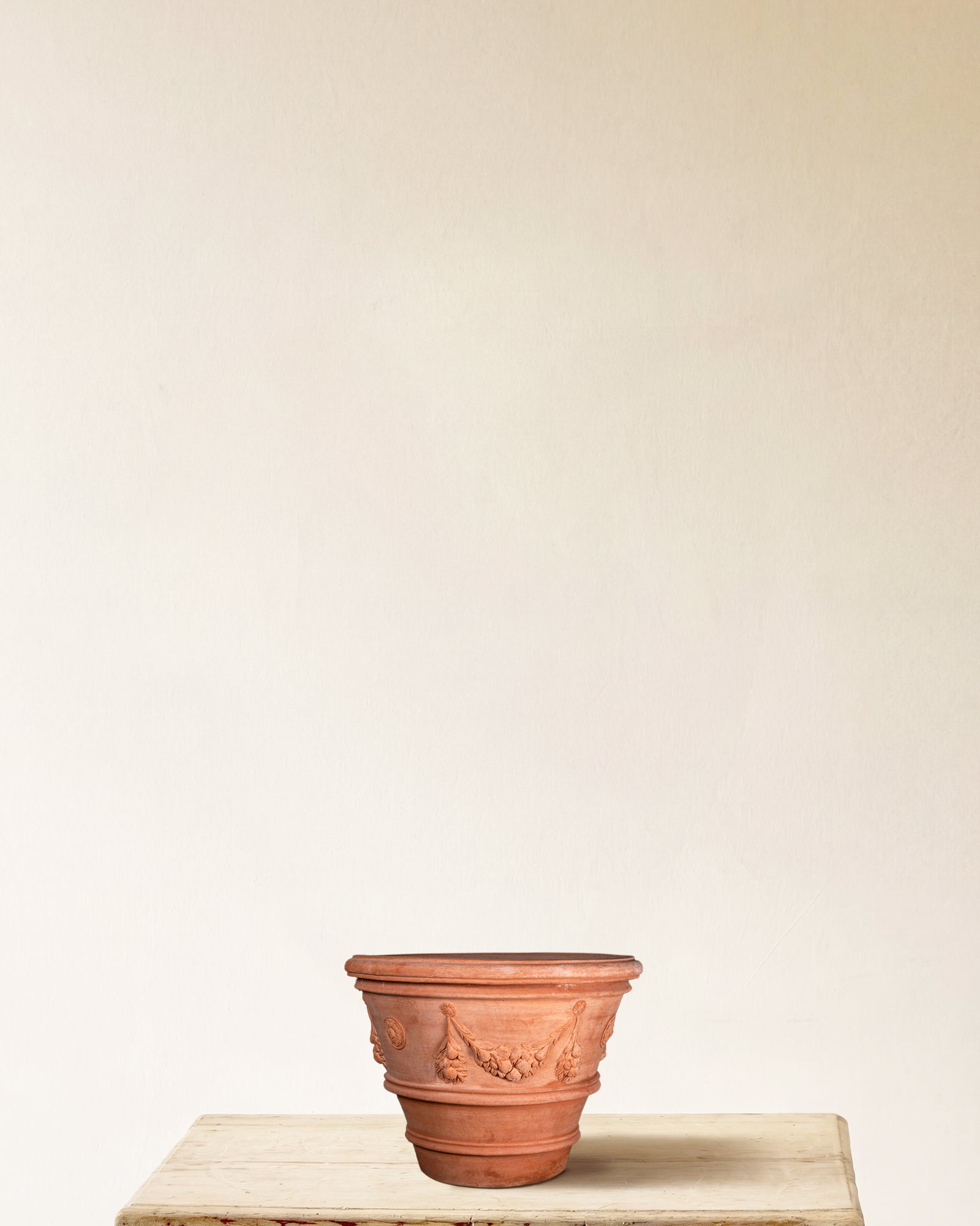 Italian terracotta planter with sculpted festoon relief, made in Impruneta, 16" x 13"