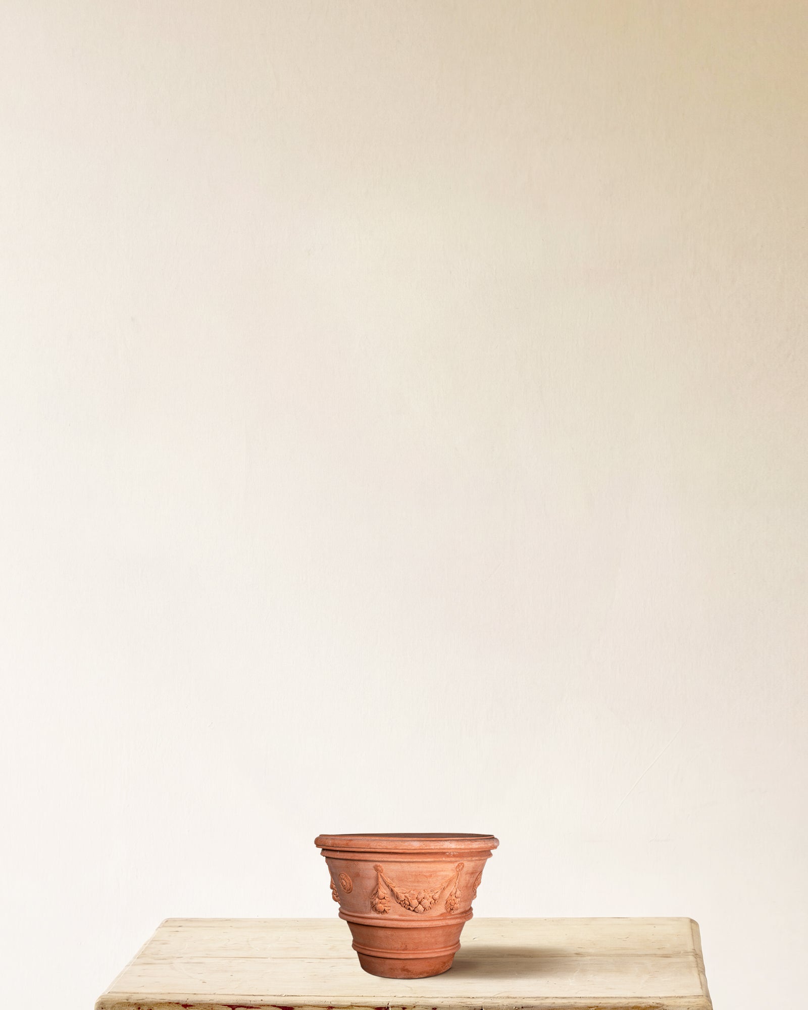 Italian terracotta planter with sculpted festoon relief, made in Impruneta, 12" x 11"