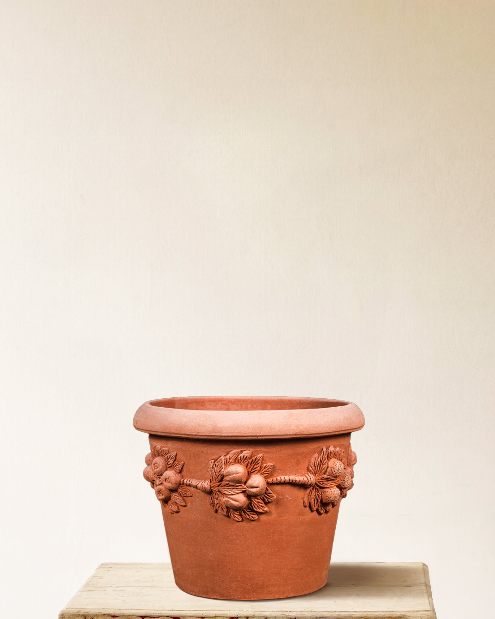 Italian terracotta planter with Della Robbia-style fruit and leaf garland relief, made in Impruneta, 22" x 20"