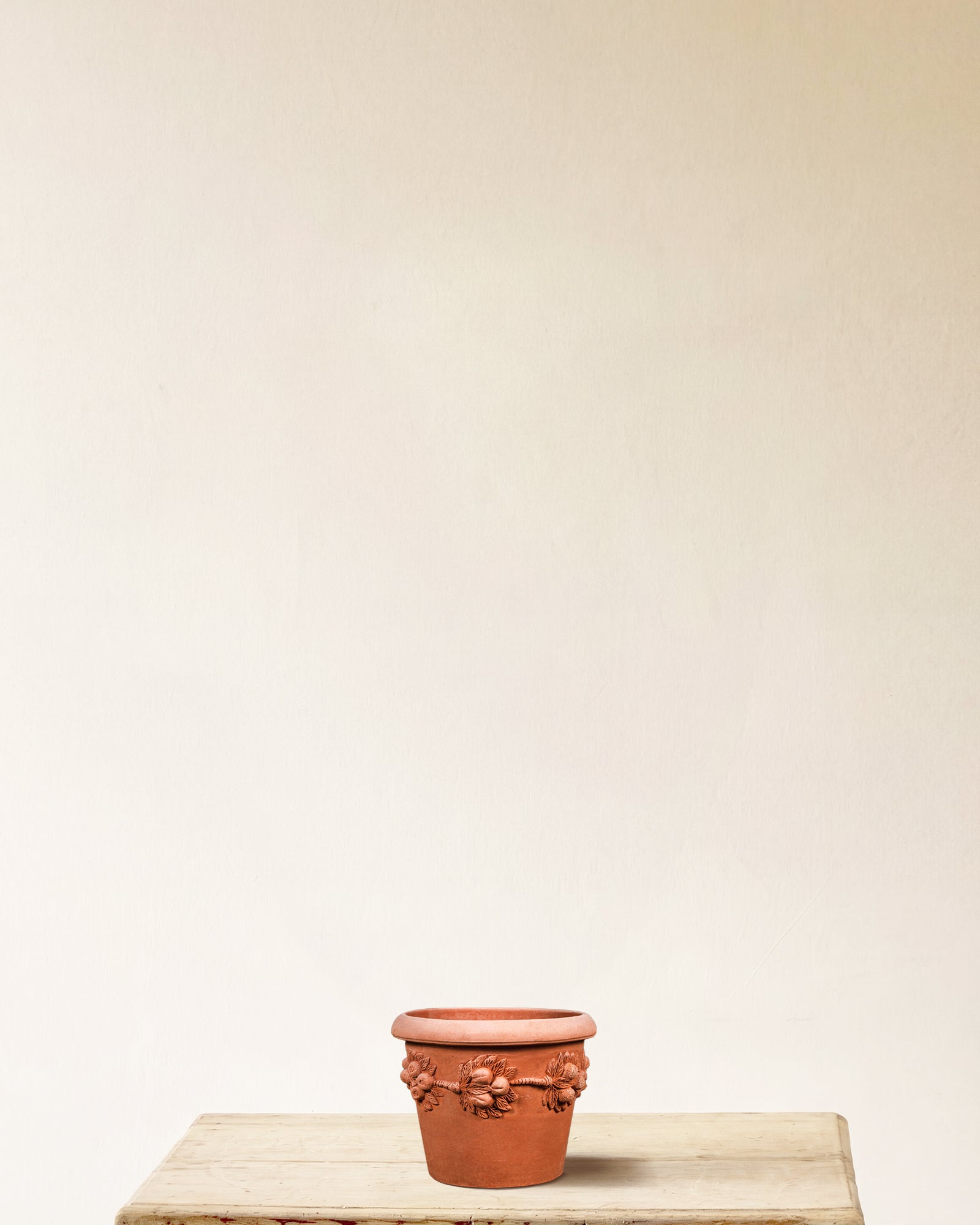 Italian terracotta planter with Della Robbia-style fruit and leaf garland relief, made in Impruneta, 10" x 9"