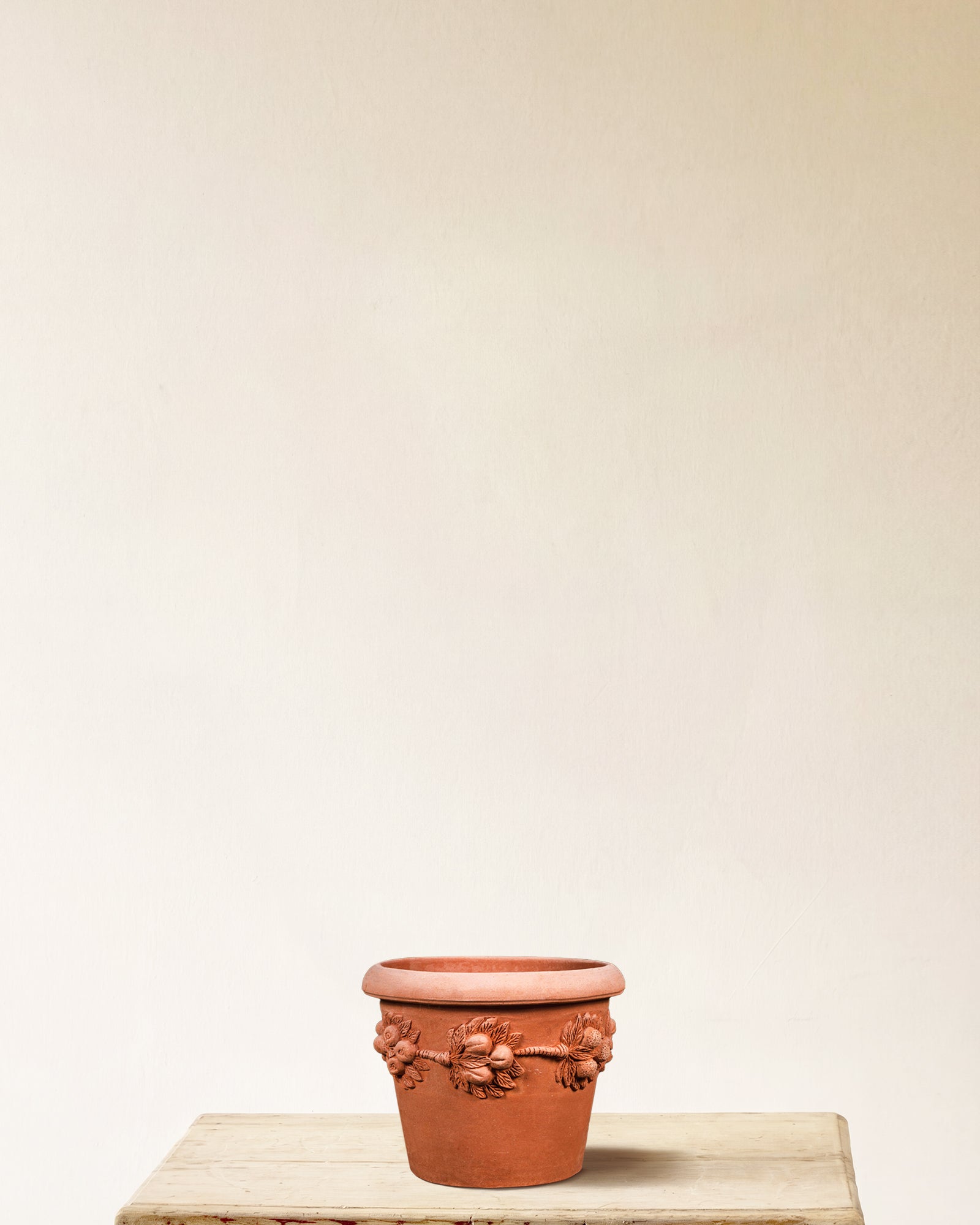 Italian terracotta planter with Della Robbia-style fruit and leaf garland relief, made in Impruneta, 12" x 11"