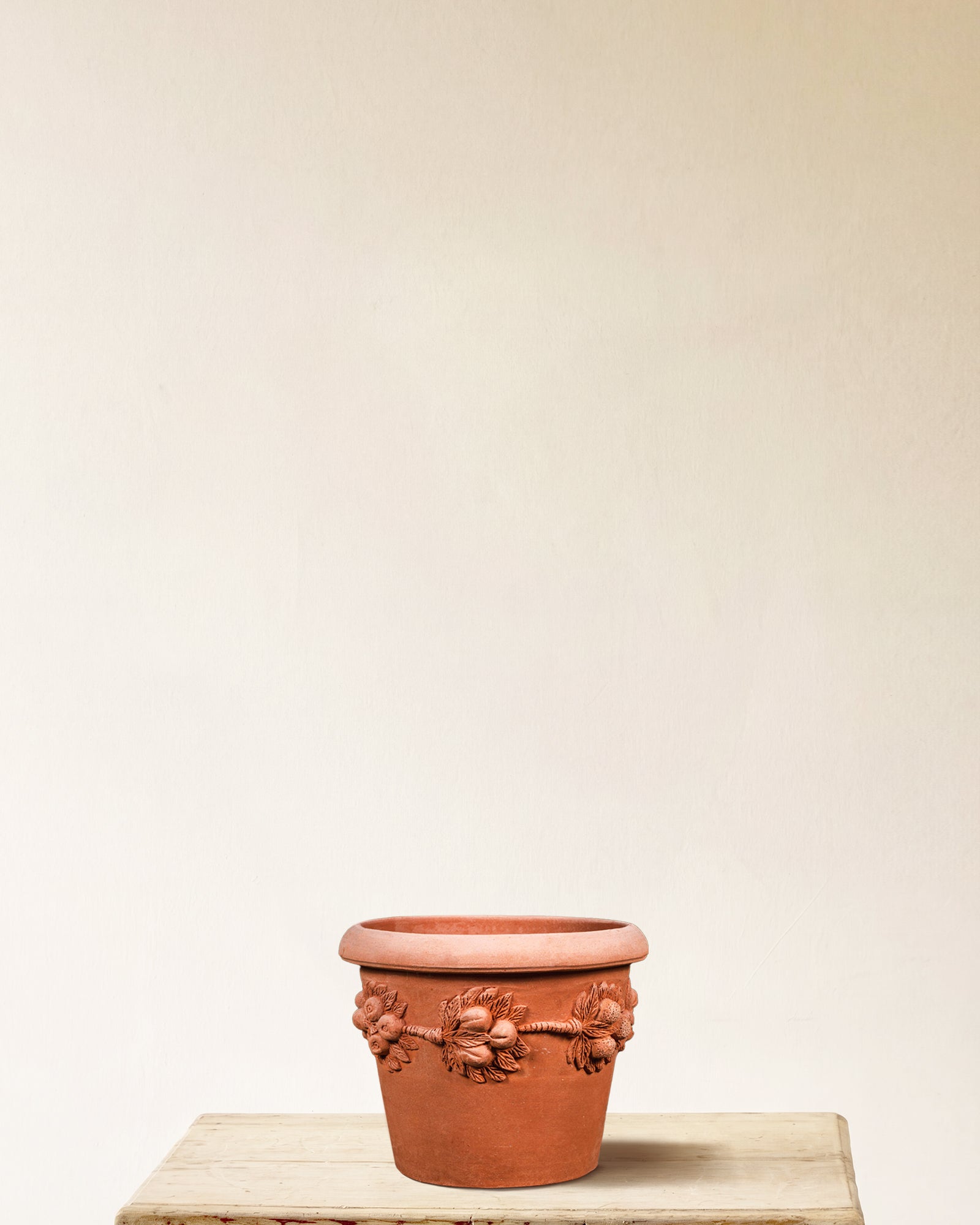 Italian terracotta planter with Della Robbia-style fruit and leaf garland relief, made in Impruneta, 14" x 13"