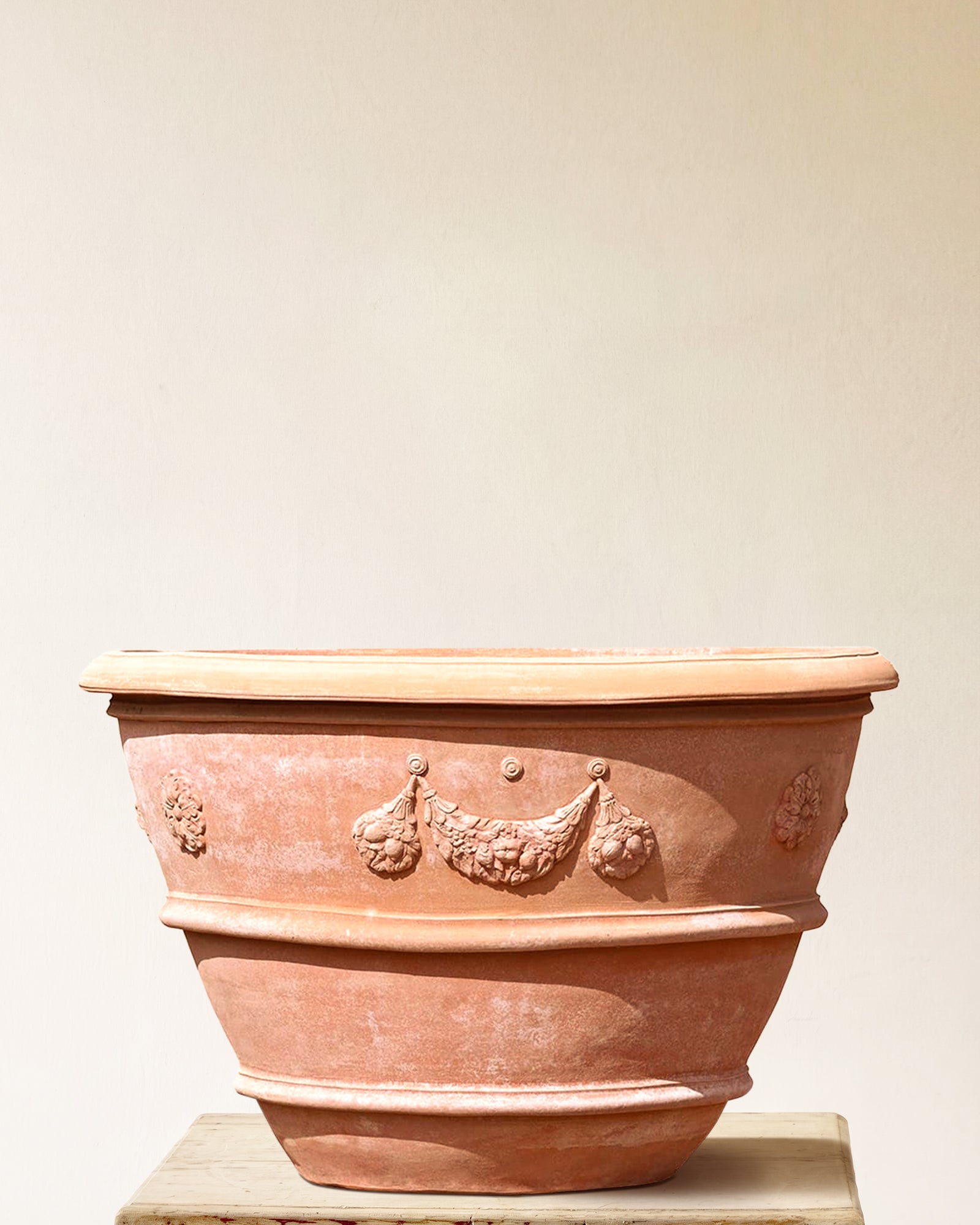 Italian terracotta planter with wide flared form and sculpted festoon band below rim, made in Impruneta, 39" x 30"