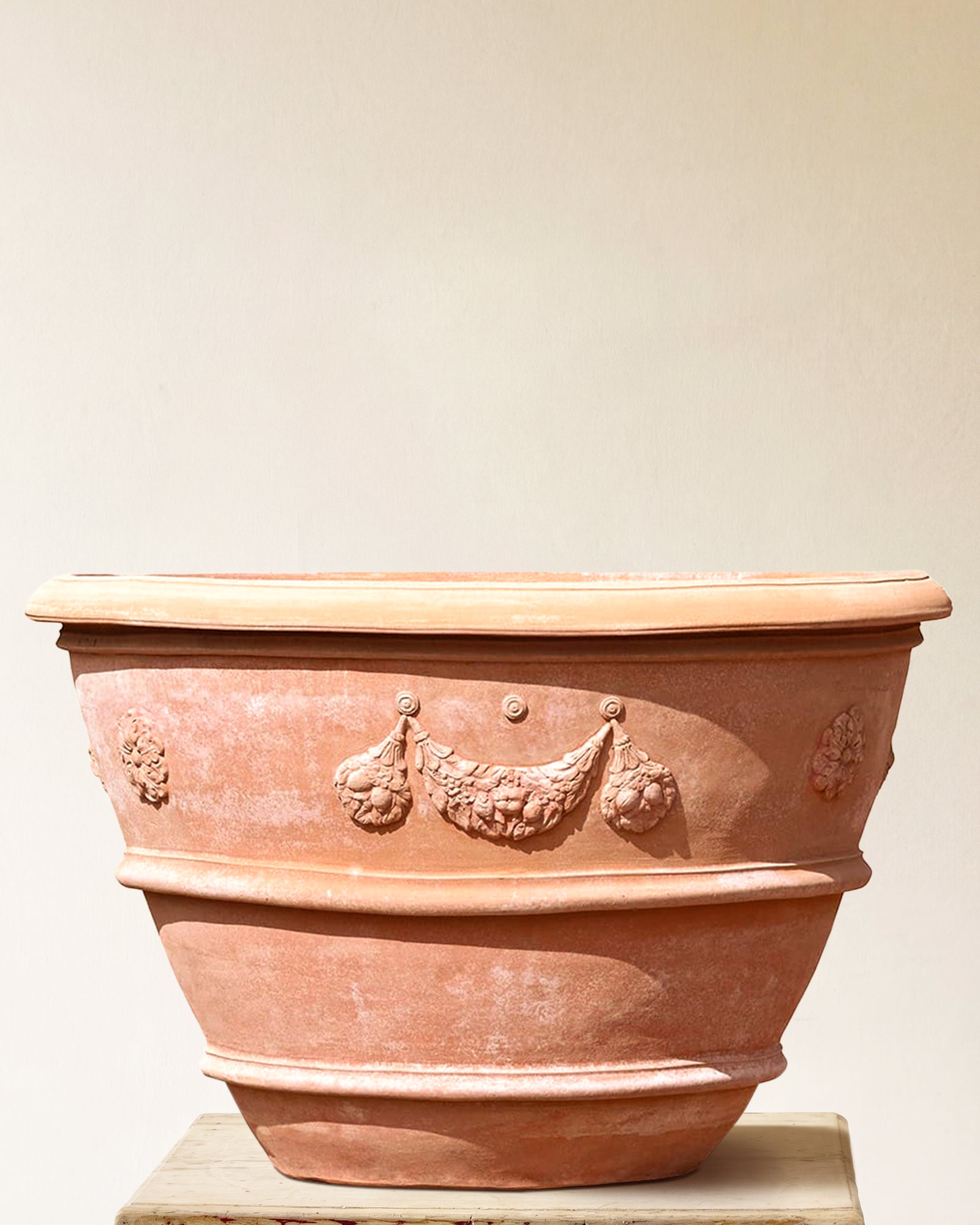 Italian terracotta planter with wide flared form and sculpted festoon band below rim, made in Impruneta, 47" x 35"