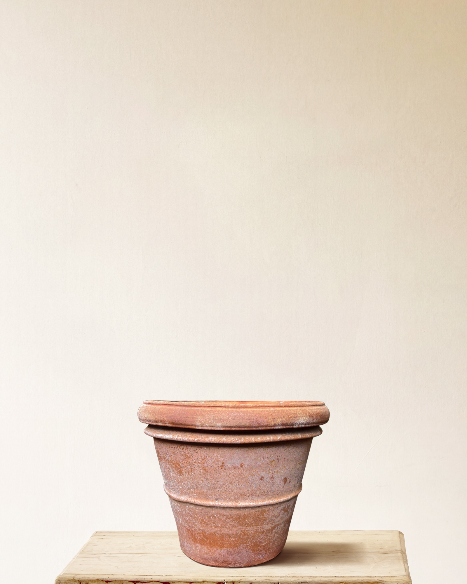 Italian terracotta planter with rounded form and wide rolled rim, smooth surface, made in Impruneta, 18" x 15"