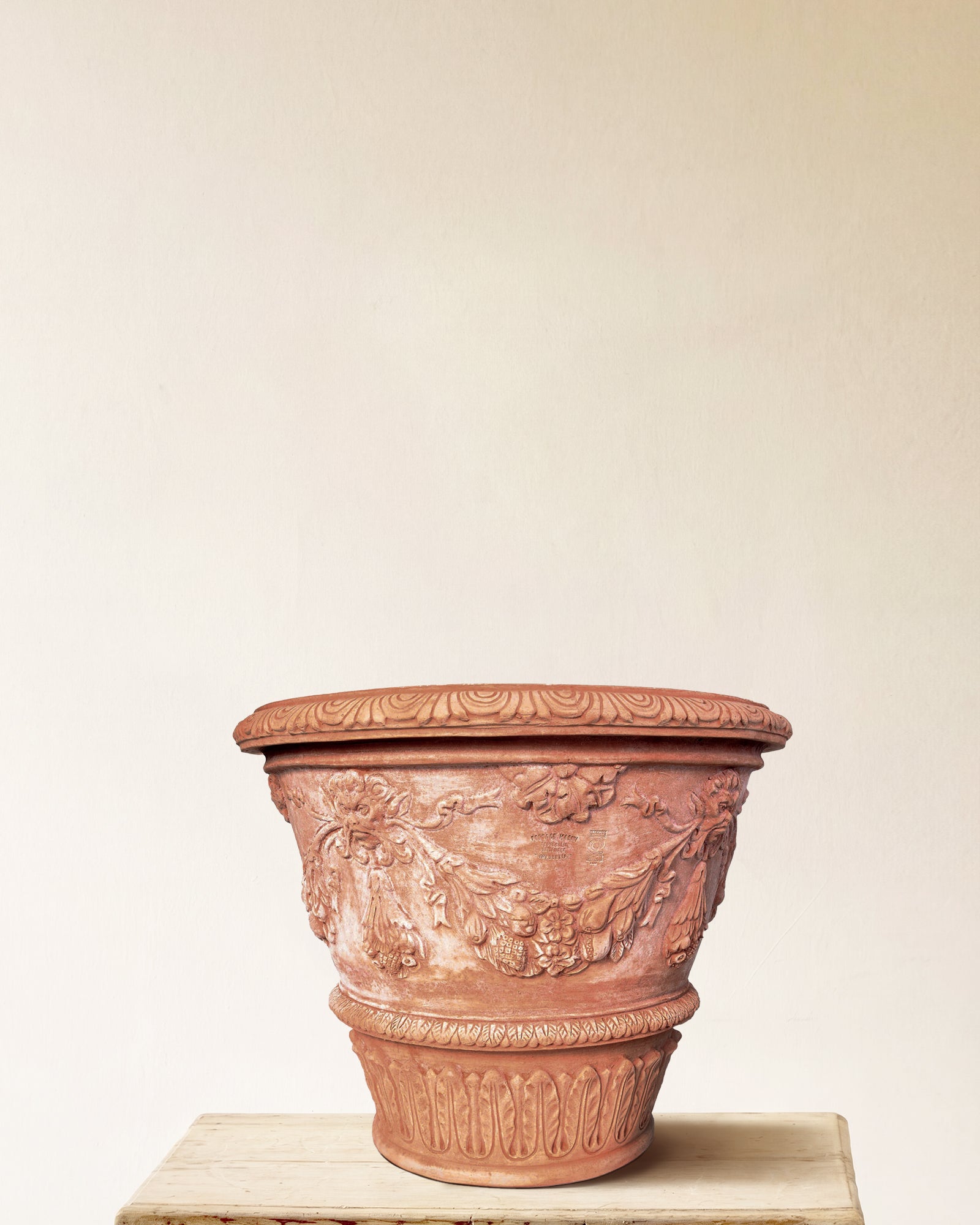 Italian terracotta planter with dense garland, botanical, and acanthus relief, made in Impruneta, 27" x 27"