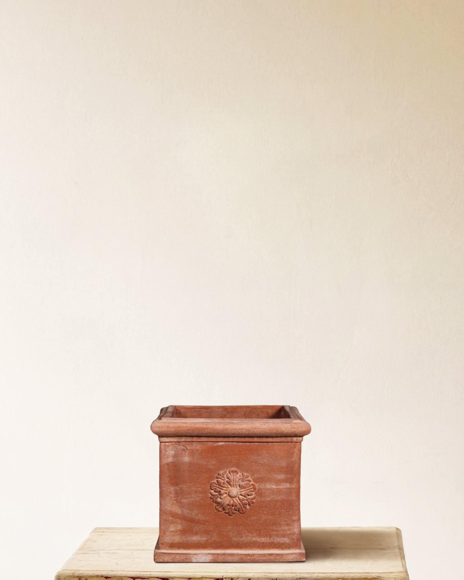 Italian terracotta square planter with carved rosette on each face, made in Impruneta, 18" x 16"