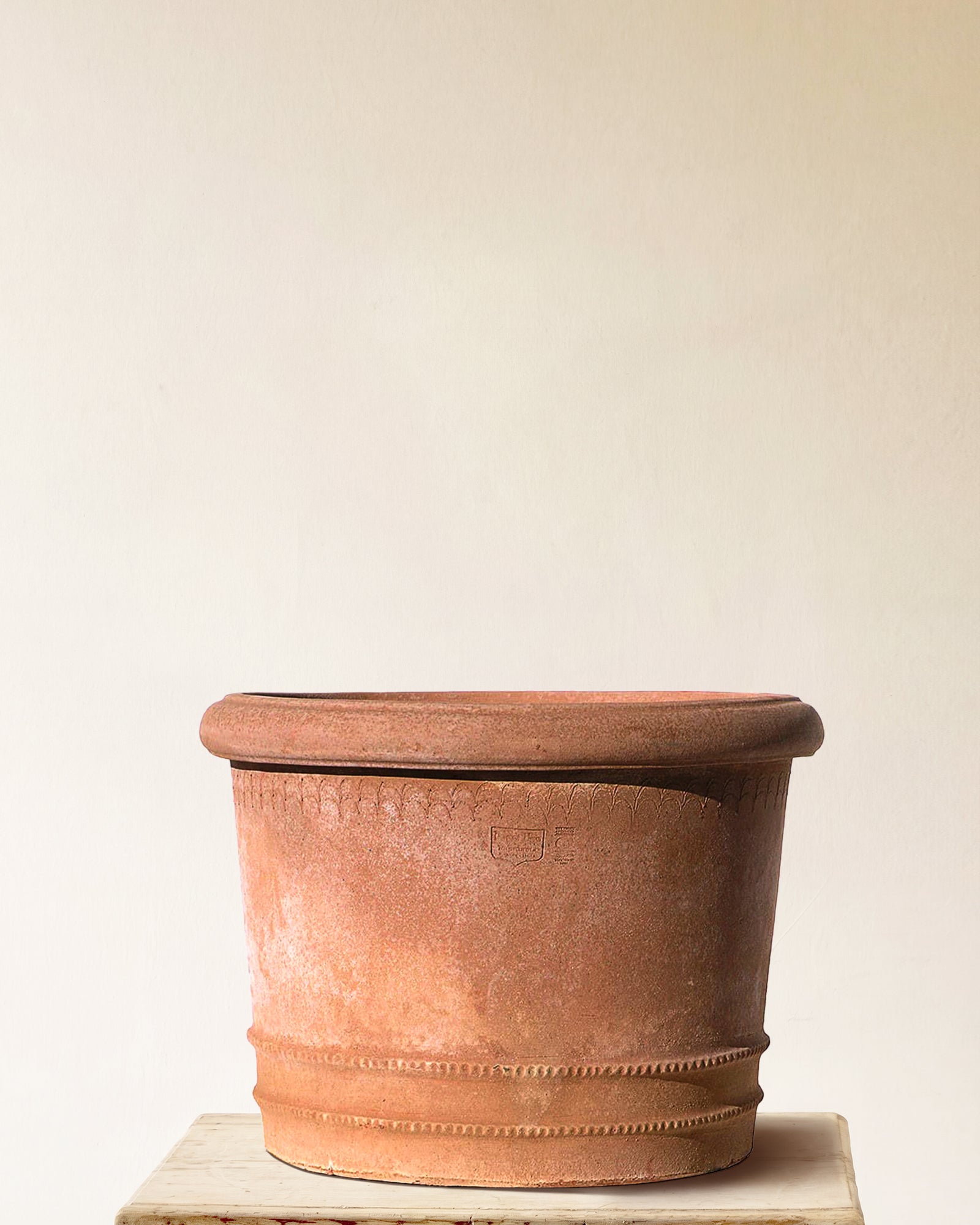 Italian terracotta planter with wide flared form and sculpted festoon band below rim, made in Impruneta, 47" x 35"