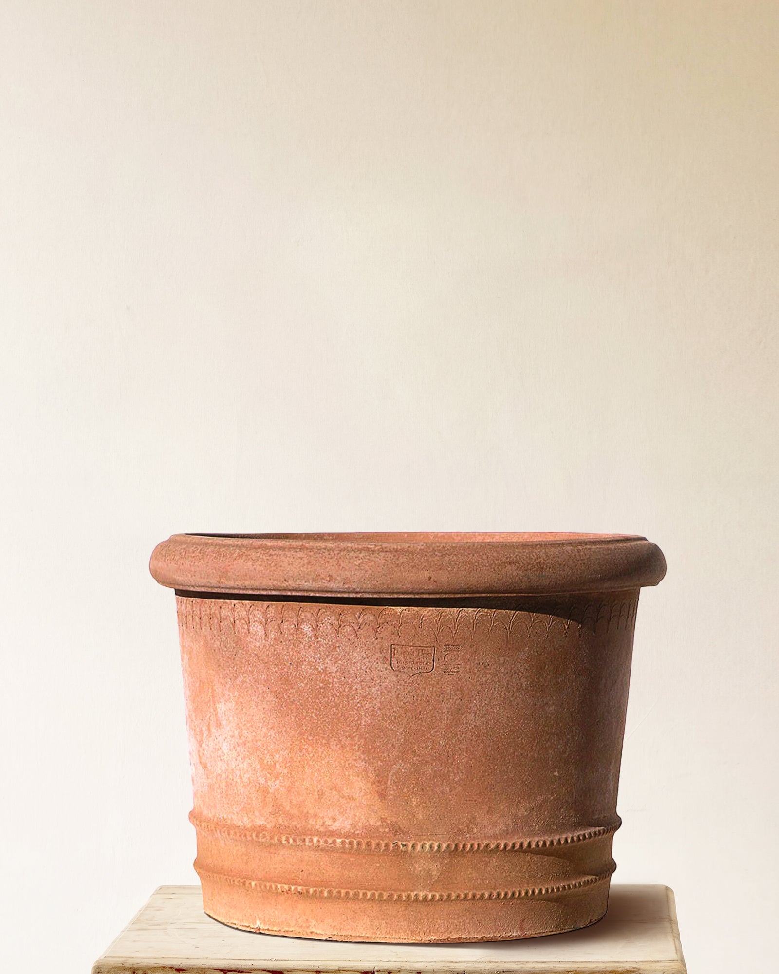 Italian terracotta planter with wide flared form and sculpted festoon band below rim, made in Impruneta, 51" x 38"