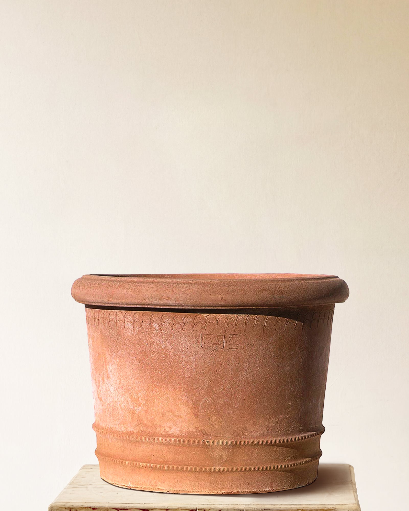 Italian terracotta planter with wide flared form and sculpted festoon band below rim, made in Impruneta, 55" x 39"